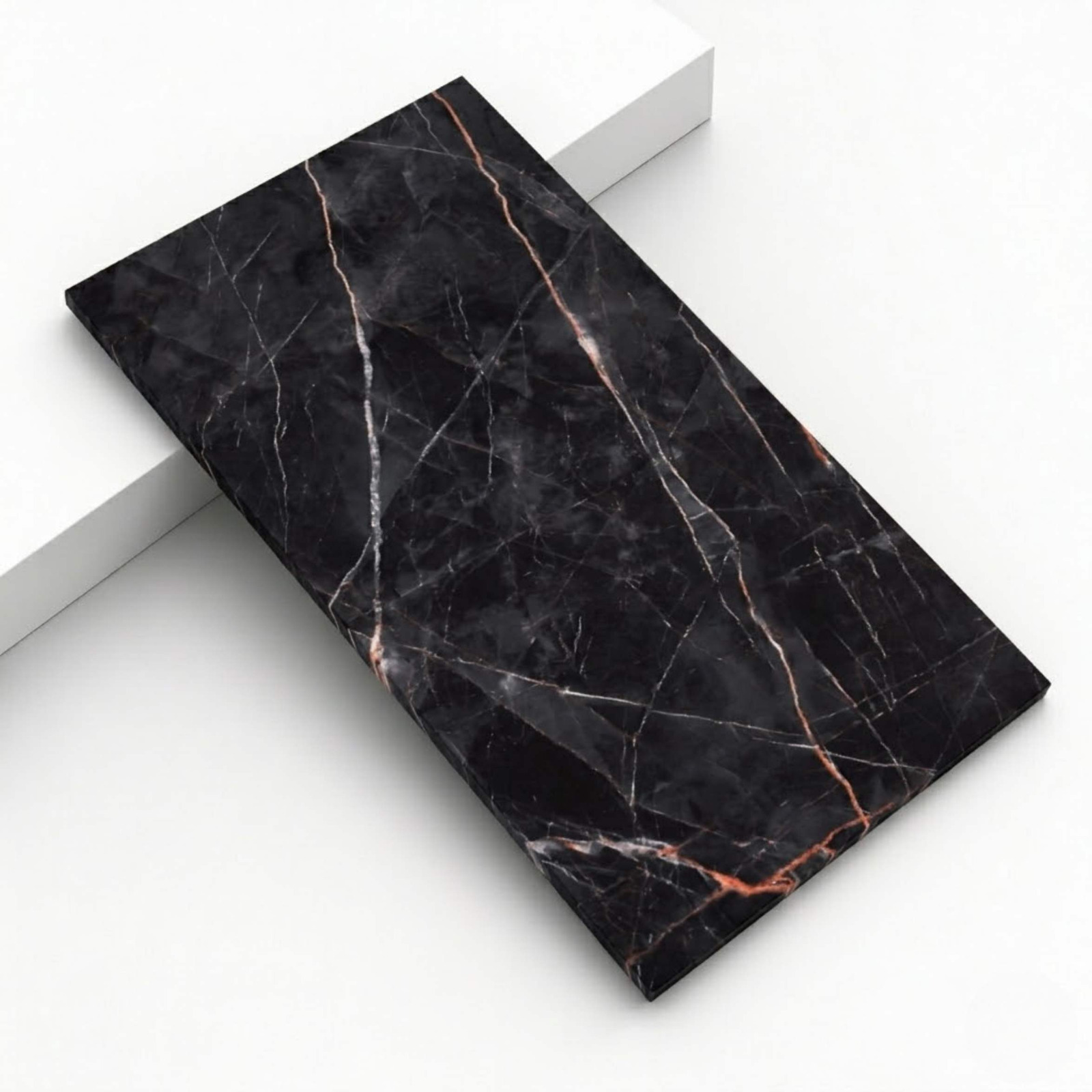 Black marble tile with gold veins