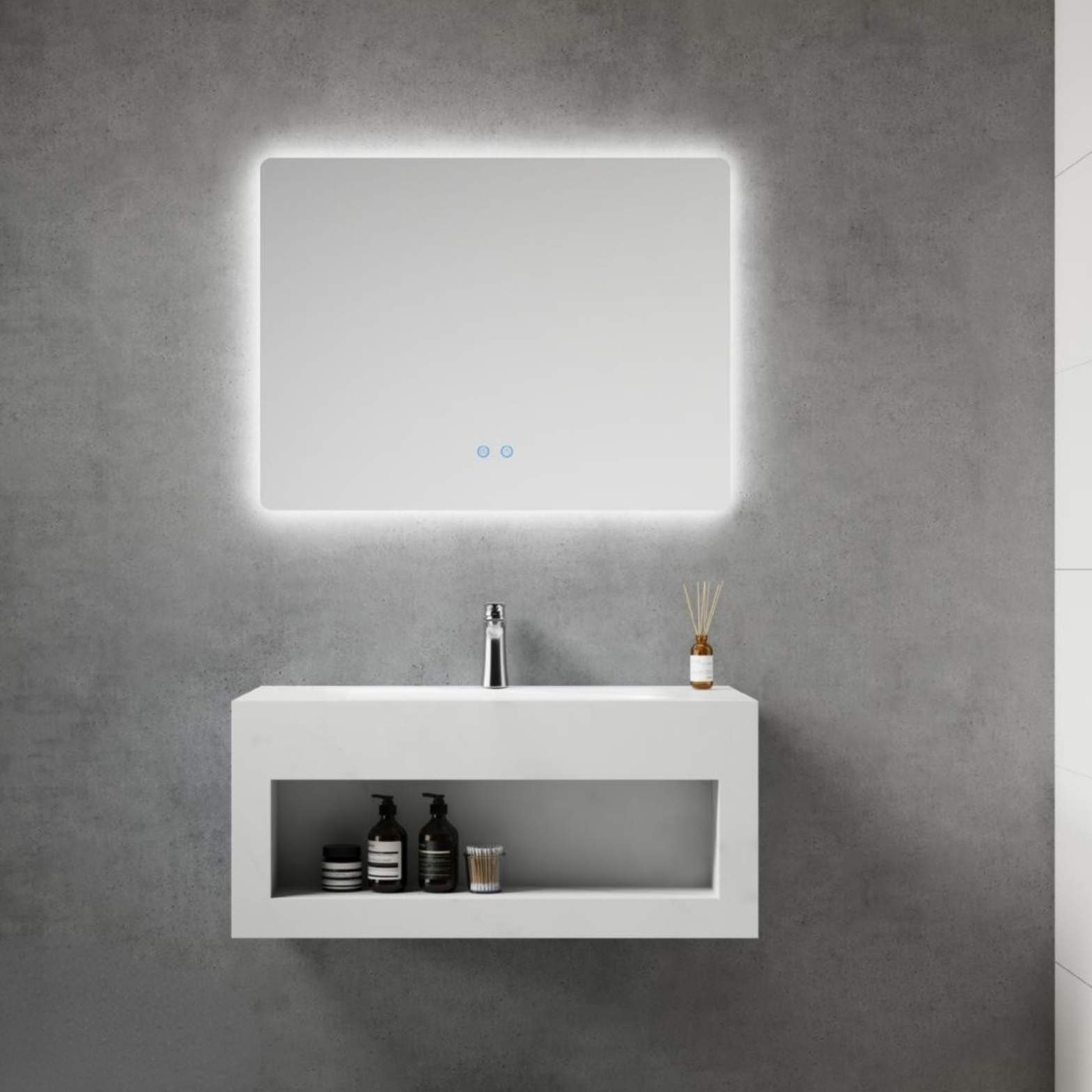 A rectangular bathroom mirror with a glowing backlit LED frame, mounted above a white floating vanity against a textured gray concrete wall.