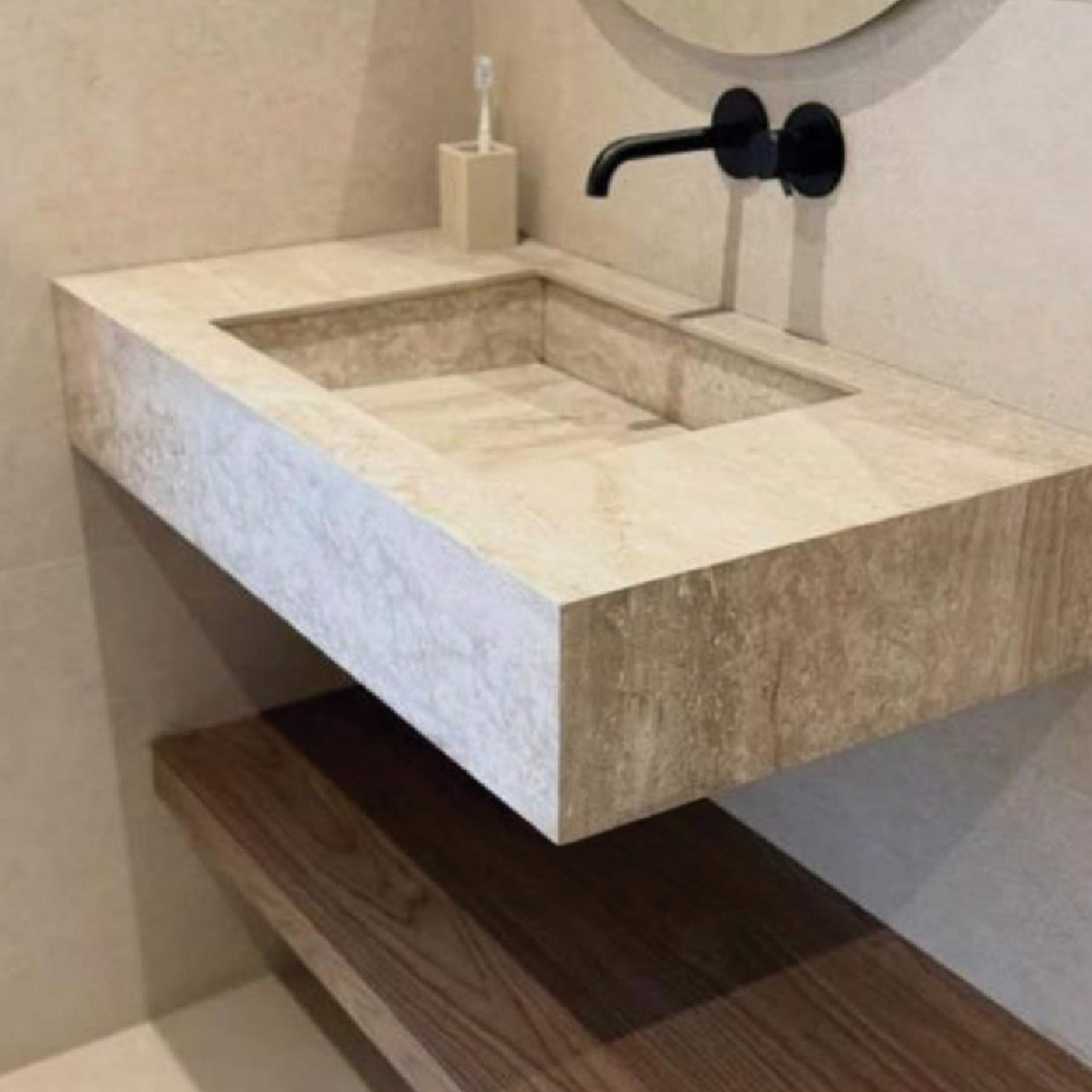 Limestone vanity with walnut shelf